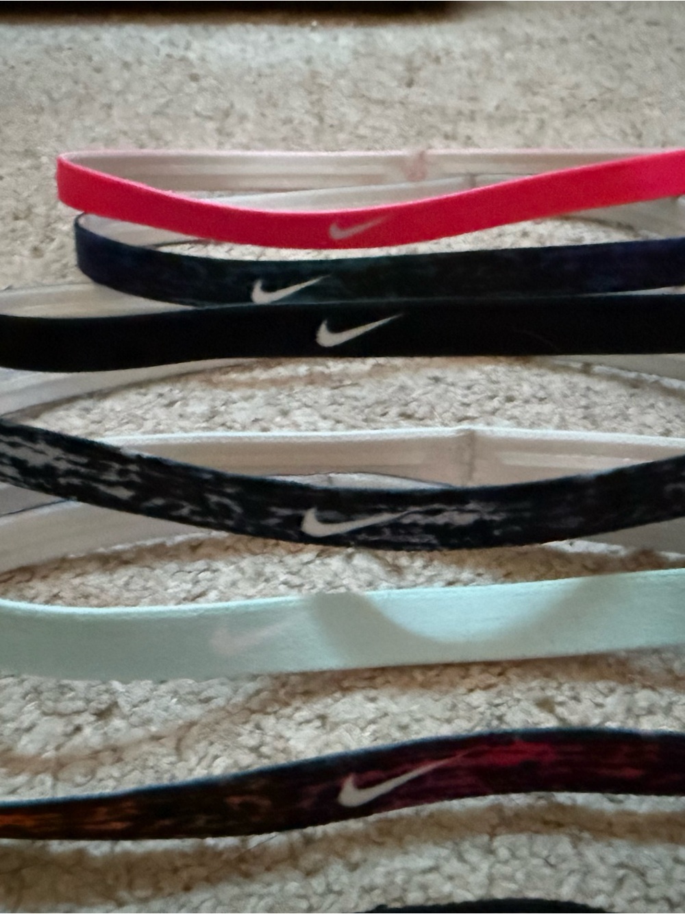 Six nike headband and six under armor headbands